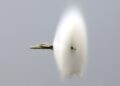 Fighter jet breaking the sound barrier