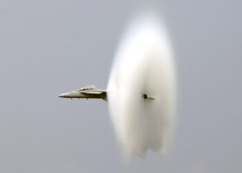 Fighter jet breaking the sound barrier