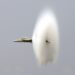 Fighter jet breaking the sound barrier