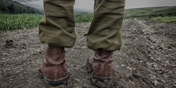 Soldiers boots. Illustrative