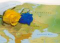 Map of Europe with blue and yellow roses
