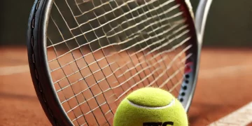 Tennis rocket and a ball